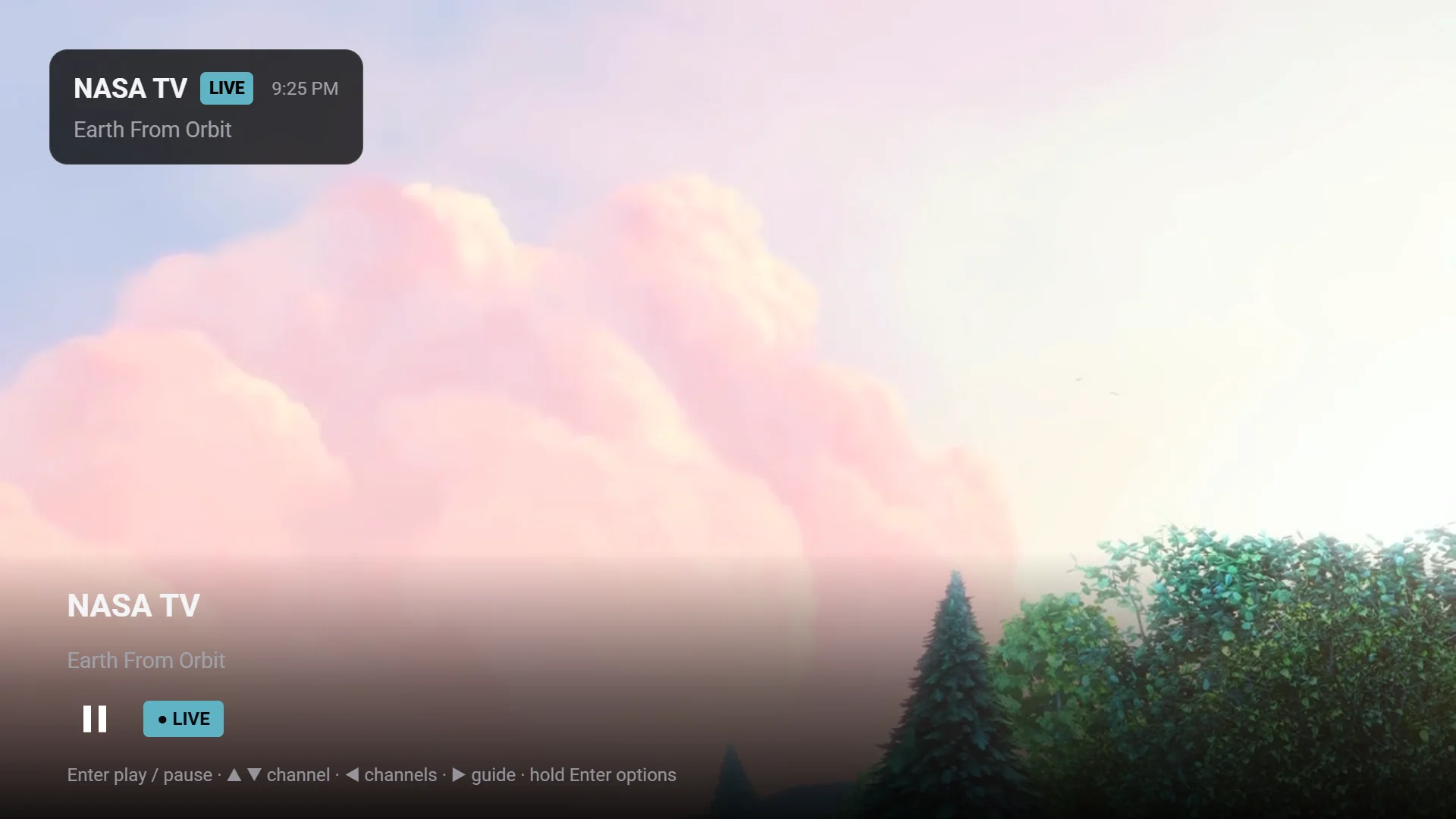 KimberPlay's player over a live channel: channel banner with LIVE badge, transport bar, and key hints